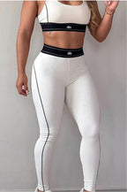 Alo set de dos piezas pantalón y top blanco y negro.